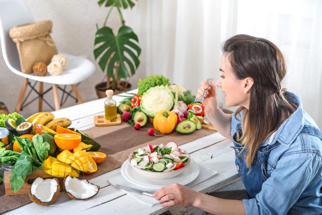 Hormonal balance nutrition for women with healthy foods fruits vegetables and balanced meals.